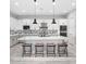 Modern kitchen island with white quartz countertops and gray cabinets at 20363 W Coolidge St, Buckeye, AZ 85396