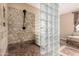 Spa-like bathroom with glass block shower and tile flooring at 21525 E Camacho Rd, Queen Creek, AZ 85142