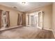 Bedroom with carpet and French doors leading to another room at 21525 E Camacho Rd, Queen Creek, AZ 85142