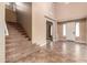 Bright entryway with tiled floors and a staircase at 21525 E Camacho Rd, Queen Creek, AZ 85142