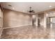 Bright living room with tile flooring and high ceilings at 21525 E Camacho Rd, Queen Creek, AZ 85142