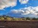 Backyard view showcasing mountain landscape and clear sky at 2185 E Hazeltine Way, Gilbert, AZ 85298