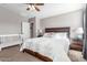 Spacious bedroom with king-size bed and plenty of natural light at 2185 E Hazeltine Way, Gilbert, AZ 85298