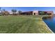 Community center with lawn and pond views at 2185 E Hazeltine Way, Gilbert, AZ 85298