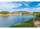 Serene lake with fountain and mountain views at 2185 E Hazeltine Way, Gilbert, AZ 85298