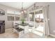 Charming kitchen nook with built-in bench seating and backyard access at 2185 E Hazeltine Way, Gilbert, AZ 85298