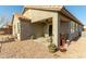 Relaxing covered patio with seating and desert landscaping at 2185 E Hazeltine Way, Gilbert, AZ 85298