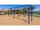 Community playground with swings and trees at 2185 E Hazeltine Way, Gilbert, AZ 85298