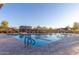 Community pool with playground and shaded seating at 2185 E Hazeltine Way, Gilbert, AZ 85298