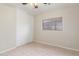 Bedroom with hardwood floors, ceiling fan, and sliding door to closet at 2298 E Hazeltine Way, Chandler, AZ 85249