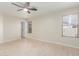 Bright bedroom with hardwood floors and ceiling fan at 2298 E Hazeltine Way, Chandler, AZ 85249