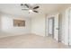 Spacious bedroom with hardwood floors and ceiling fan at 2298 E Hazeltine Way, Chandler, AZ 85249