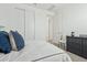 Cozy bedroom with modern decor and a large closet with sliding doors at 2324 W Moody Trl, Phoenix, AZ 85041