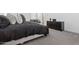 Serene bedroom showcasing a cozy bed, modern furniture, and a peaceful atmosphere at 2324 W Moody Trl, Phoenix, AZ 85041
