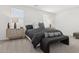 Well-decorated bedroom with a comfortable bed, stylish lamps, and plenty of natural light at 2324 W Moody Trl, Phoenix, AZ 85041