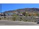 New homes under construction on a street with desert landscaping and mountain views in Arizona at 2324 W Moody Trl, Phoenix, AZ 85041