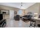 Comfortable living room featuring a gray couch and recliner at 240 W Juniper Ave # 1173, Gilbert, AZ 85233