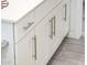 White bathroom cabinets with brushed nickel hardware at 24018 N 165Th Dr, Surprise, AZ 85387