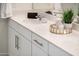 Modern bathroom vanity with white cabinets and brushed nickel hardware at 24018 N 165Th Dr, Surprise, AZ 85387