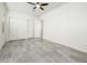 Bedroom with tile flooring and double door closet at 24018 N 165Th Dr, Surprise, AZ 85387