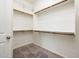 Spacious walk-in closet with double hanging rods at 24018 N 165Th Dr, Surprise, AZ 85387