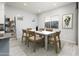 Dining room with table and chairs staged for comfortable living at 24018 N 165Th Dr, Surprise, AZ 85387