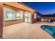 Outdoor patio with pool and built-in grill at 24018 N 165Th Dr, Surprise, AZ 85387