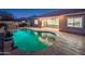 Inviting kidney shaped pool with outdoor kitchen at 24018 N 165Th Dr, Surprise, AZ 85387