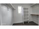 Spacious closet with built-in shelving and hanging rods at 2463 W Morning Sun Cir, San Tan Valley, AZ 85144