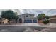 Two-story home with a two-car garage and landscaped front yard at 2463 W Morning Sun Cir, San Tan Valley, AZ 85144