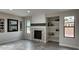 Living room fireplace with built-in shelving and decor at 2463 W Morning Sun Cir, San Tan Valley, AZ 85144