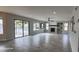 Open living area with fireplace and sliding doors to the pool at 2463 W Morning Sun Cir, San Tan Valley, AZ 85144