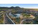 Aerial view of Sun City Festival, showcasing homes, golf course, and landscaping at 26448 W Kimberly Way, Buckeye, AZ 85396