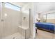 Modern bathroom with large walk-in shower and herringbone tile at 26448 W Kimberly Way, Buckeye, AZ 85396