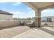 Covered patio with mountain views and comfortable seating at 26448 W Kimberly Way, Buckeye, AZ 85396