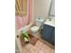 Clean bathroom with a shower/tub combo and tiled floors at 2645 W Wolf St, Phoenix, AZ 85017