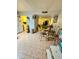 Kitchen and dining area with tiled floors and a glass dining table at 2645 W Wolf St, Phoenix, AZ 85017