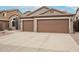 Two-car garage and front yard with gravel at 26616 N 42Nd Way, Cave Creek, AZ 85331