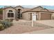 Home exterior with a two-car garage and a pool at 26616 N 42Nd Way, Cave Creek, AZ 85331