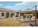 Spacious backyard with a sparkling pool and patio furniture at 26616 N 42Nd Way, Cave Creek, AZ 85331