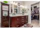 Double-vanity bathroom with a large walk-in shower and a linen closet at 2878 N Paisley Ave, Casa Grande, AZ 85122