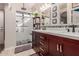 Elegant bathroom with double vanity, large shower, and mosaic tile at 2878 N Paisley Ave, Casa Grande, AZ 85122