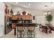 Well-equipped kitchen with an island and breakfast bar seating at 2878 N Paisley Ave, Casa Grande, AZ 85122