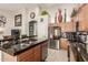 Modern kitchen with stainless steel appliances and granite countertops at 2878 N Paisley Ave, Casa Grande, AZ 85122