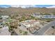 Aerial view of luxury home with pool and desert landscaping; mountain views at 34083 N Paseo Grande Dr, Queen Creek, AZ 85144