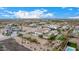 Aerial view showcasing a luxury home, pool, and surrounding desert landscape at 34083 N Paseo Grande Dr, Queen Creek, AZ 85144