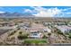 Aerial view of luxury home with pool; expansive desert lot and mountain views at 34083 N Paseo Grande Dr, Queen Creek, AZ 85144