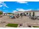 Spacious backyard with a pool, patio, and grilling area at 34083 N Paseo Grande Dr, Queen Creek, AZ 85144