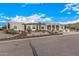 Modern home with desert landscaping and mountain views at 34083 N Paseo Grande Dr, Queen Creek, AZ 85144