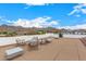 Rooftop terrace with seating area and mountain views at 34083 N Paseo Grande Dr, Queen Creek, AZ 85144